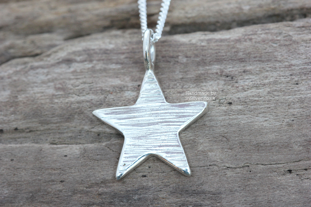 Mini Star line hammered close up wm 1024