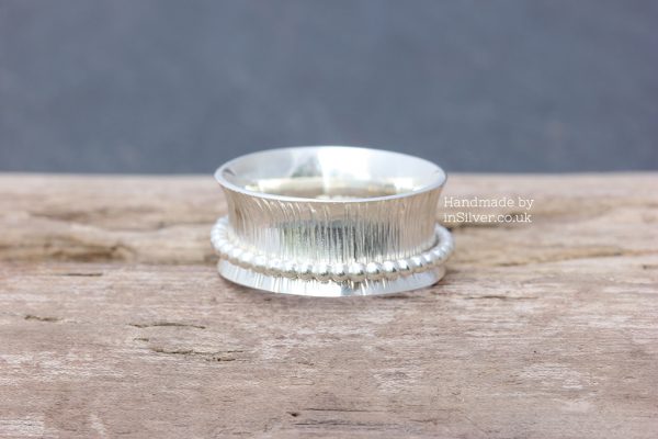 Spinner Ring - Line hammered/bead band 1