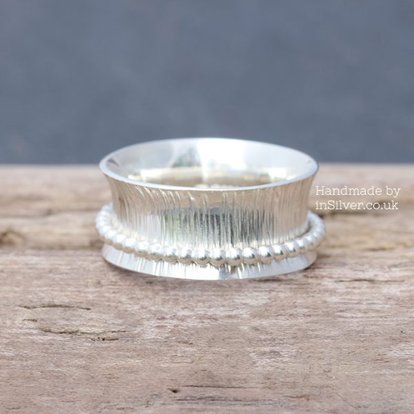 Spinner Ring - Line hammered/bead band 1