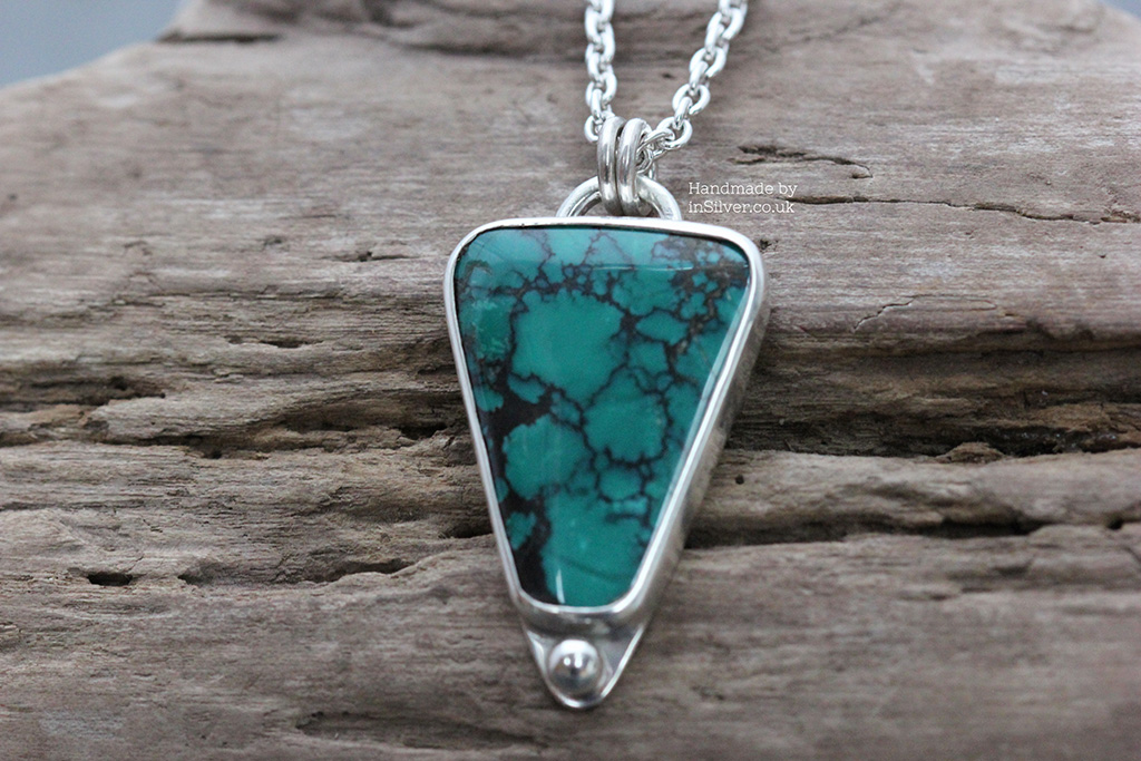 African Turquoise Triangle pendant wood 1 wm 1024 African Turquoise handmade sterling silver triangular pendant