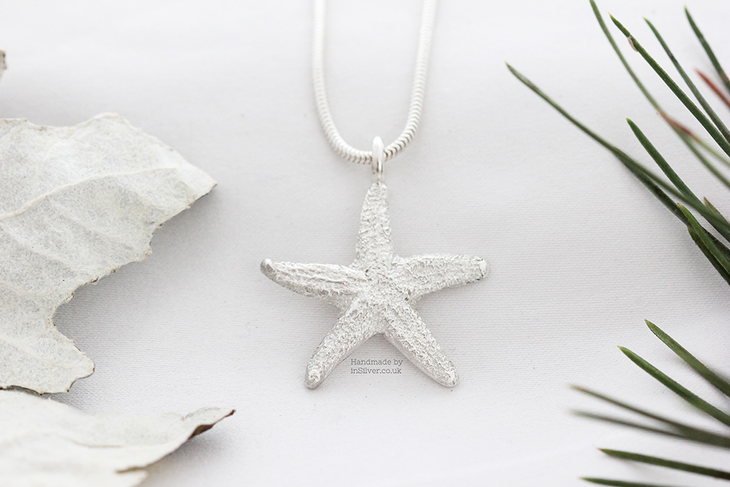 Silver Starfish Snake festive wm 1024 Sterling silver starfish pendant - silver finish